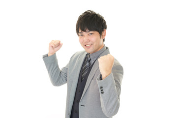 ガッツポーズのビジネスマン