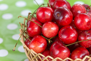 Cherries in the basket blurred background
