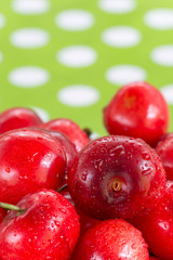Selective focus cherry basket blurred background