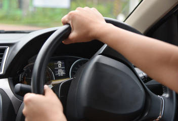 blurred hand driving on the street