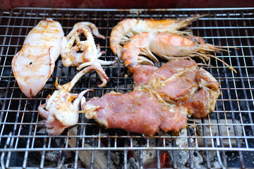 Shrimp, squid, beef seafood grill