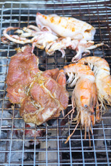 Shrimp, squid, beef seafood grill