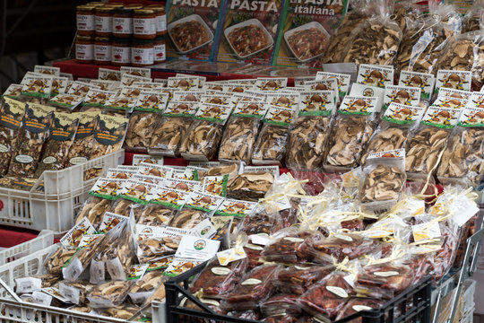  Packaging with colorful and brown pasta on the market Campo dei Fiori in Rome, Italy