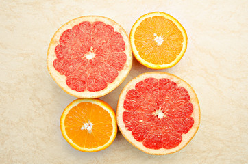 Fototapeta na wymiar Fresh grapefruit and orange . Vitamins for health.