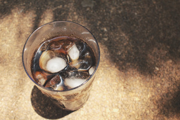 Cola with ice cubes