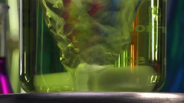 magnetic agitator at work with yellow liquid beaker