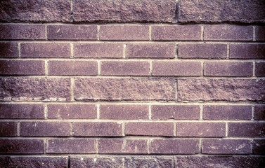     wall texture of dark pink brick 