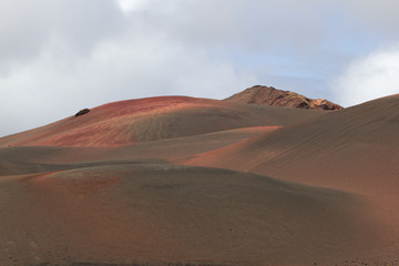 Fototapeta na wymiar Desert stone volcanic landscape in Lanzarote, Canary Islands 