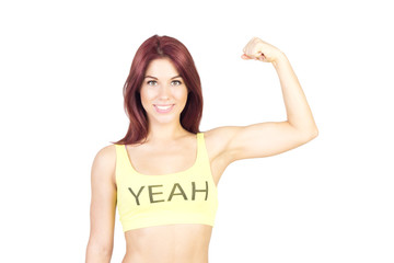 Fototapeta premium Sport smiling woman shows off his muscles. Sports and fitness concept.