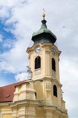 Obraz premium Tower of baroque Parish church in Laxenburg near Vienna, Lower Austria
