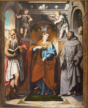 BRESCIA, ITALY - MAY 22, 2016: The pain of St. Margaret of Antioch, St. Francis of Assisi, and St. Jerome in church Chiesa di San Francesco d'Assisi by Alessandro Bonvicino - Moretto (1498 - 1554)