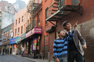 Fototapeta na wymiar Asian brothers in chinatown