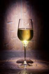 Wine glass on wooden background