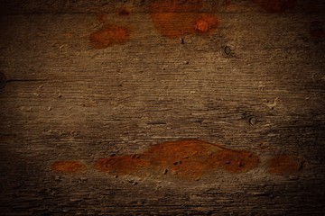 dark old wood board use for background. rust on a wooden surface