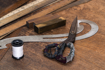 Sewing accessories on wooden table
