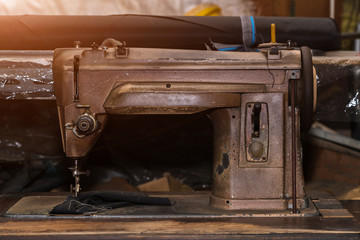 Close-up of antique sewing machine.
