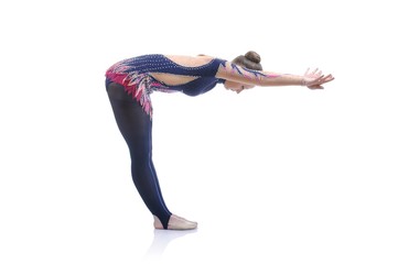 Beautiful artistic female gymnast working out, performing art gymnastics element