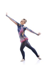 Obraz premium Beautiful artistic female gymnast working out, performing art gymnastics element