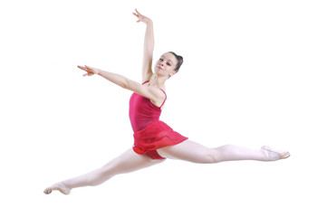 Beautiful artistic female ballerina working out, performing art element