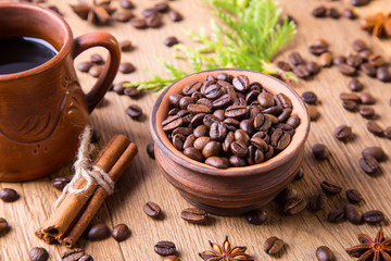 grains of black coffee and black coffee
