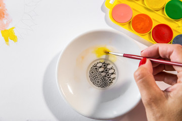 Woman hands painting