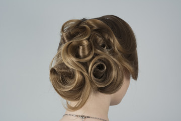 Beauty with hair in romantic style