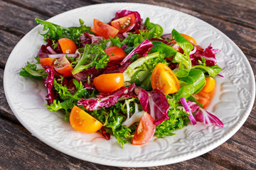 Summer colorful Tomatoes Red, Yellow salad with vegetables. concept healthy food.