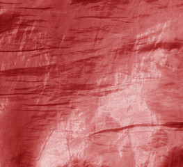 Abstract red fabric texture.