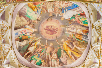 Fototapeta na wymiar CREMONA, ITALY - MAY 24, 2016: The fresco Glory of Heaven on cupoloa in presbytery of Chiesa di San Sigismondo by Camillo Boccaccino (1505 - 1546)