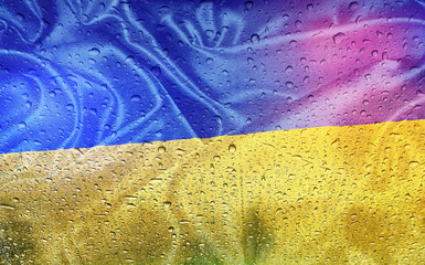 Ukrainian flag with watter drops, rainy weather, Ukraine