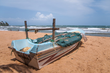 Fisherman boat at Mount Lavinia beach near Colombo