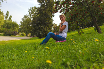 The girl in the flowered garden	