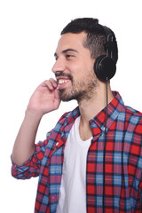 Young latin man listening to music