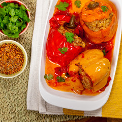 Baked Stuffed Red Bell Pepper with Meat and Rice. Selective focus.