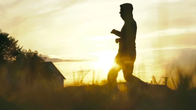Slow motion of a young sportsman taking exercise in extreme sport