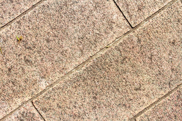 Red-tiled floor granite focused from above