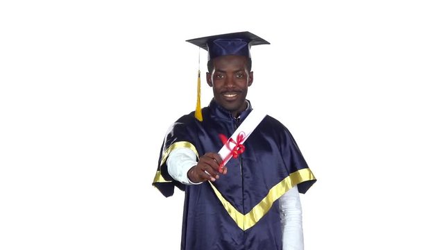 Student with graduation gown and diplom. Slow motion. White