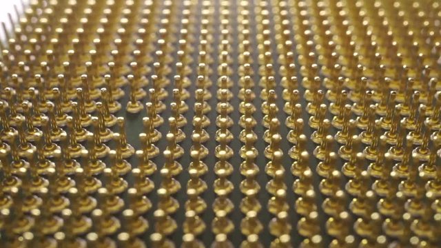 Pins of central processing unit of computer. Macro dolly shot