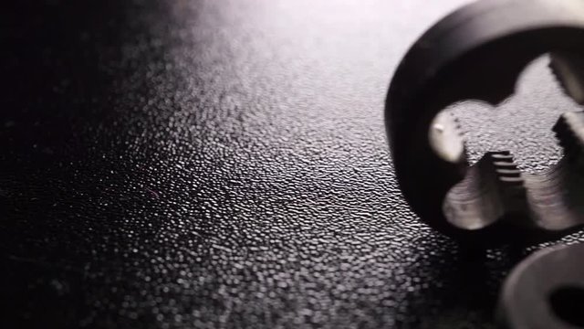 Thread-cutting dies dolly shot