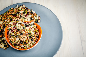 legumes in a dish on table, close up, background.