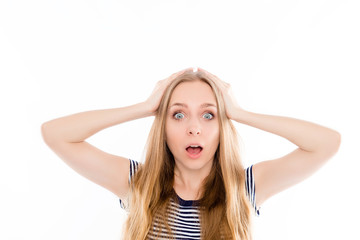 Fototapeta premium Shocked beautiful girl holding head with hands