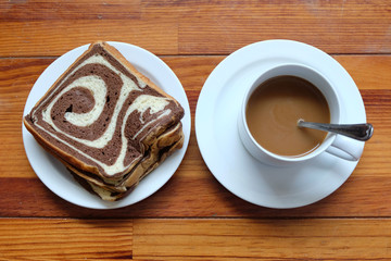 Two Tone Toast and coffee in the wood floor