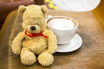 Bear with coffee cup