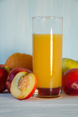 peach juice glass with fruit