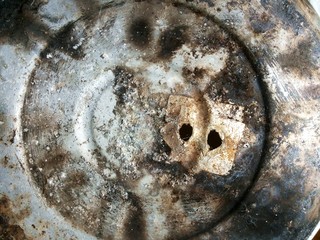 Old steamer pot,Texture of old scratched dirty metal,The surface of the metal being heated,Burn...