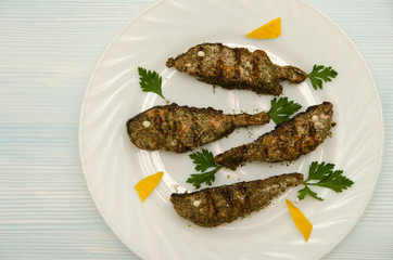 salmon slices round white plate