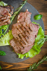 grilled entrecote black plate top view