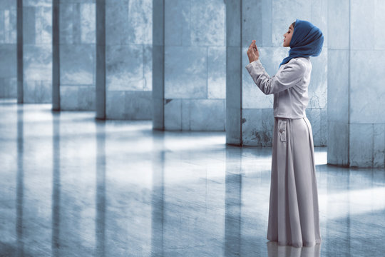 Asian muslim woman praying