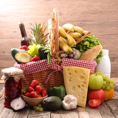 Foto op Plexiglas basket with assorted food © M.studio