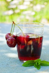 Summer drink with cherries.selective focus